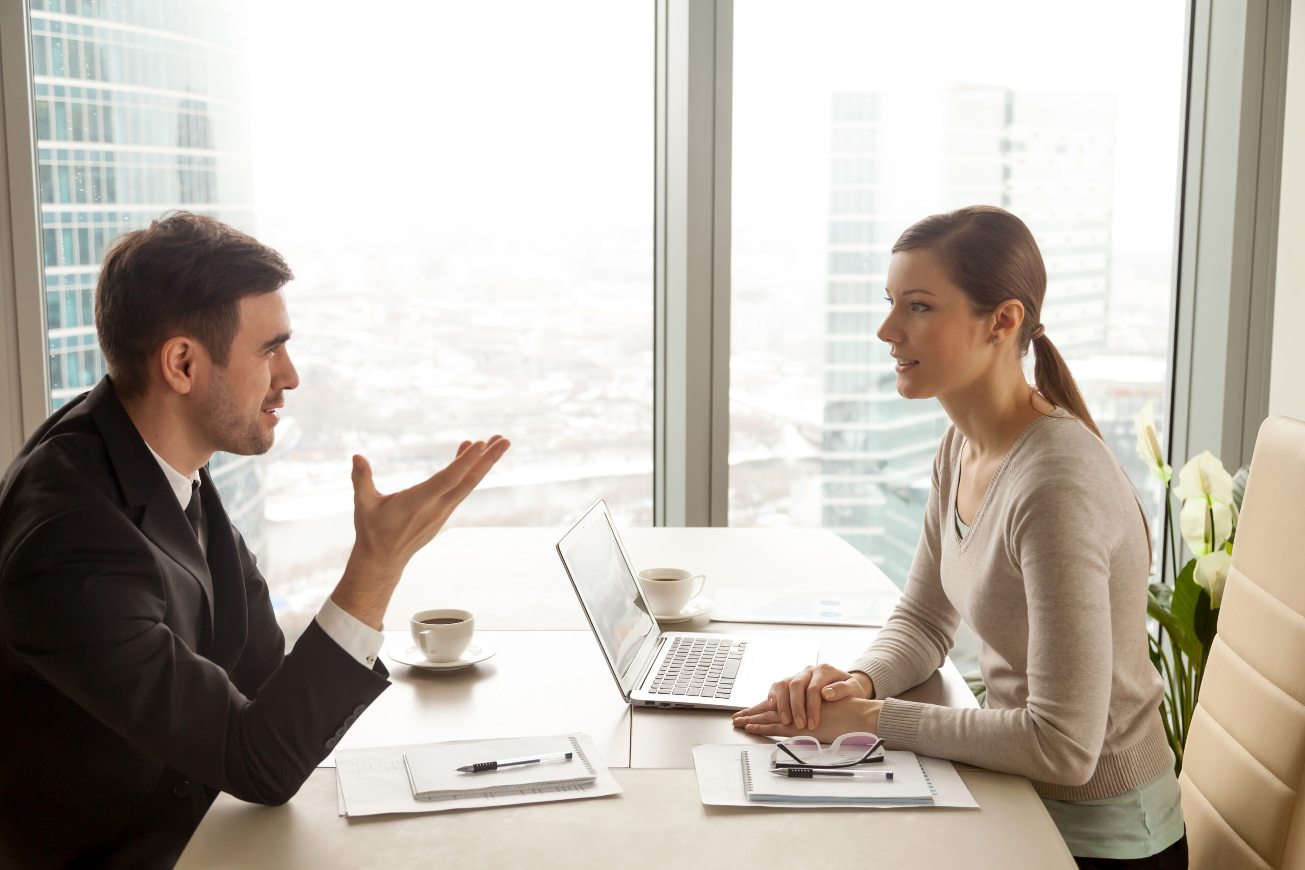 businessman-businesswoman negotiating salary